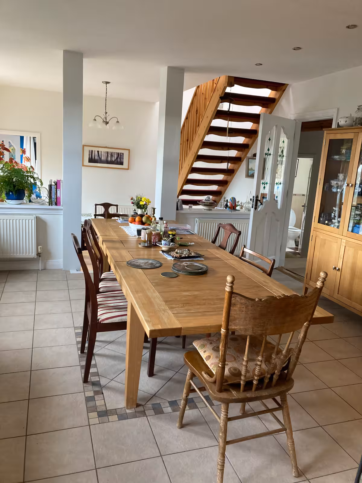 Main dining room with long oak table