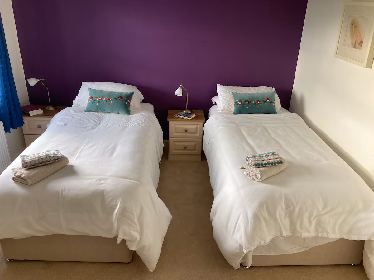 Twin bedroom with fresh linen